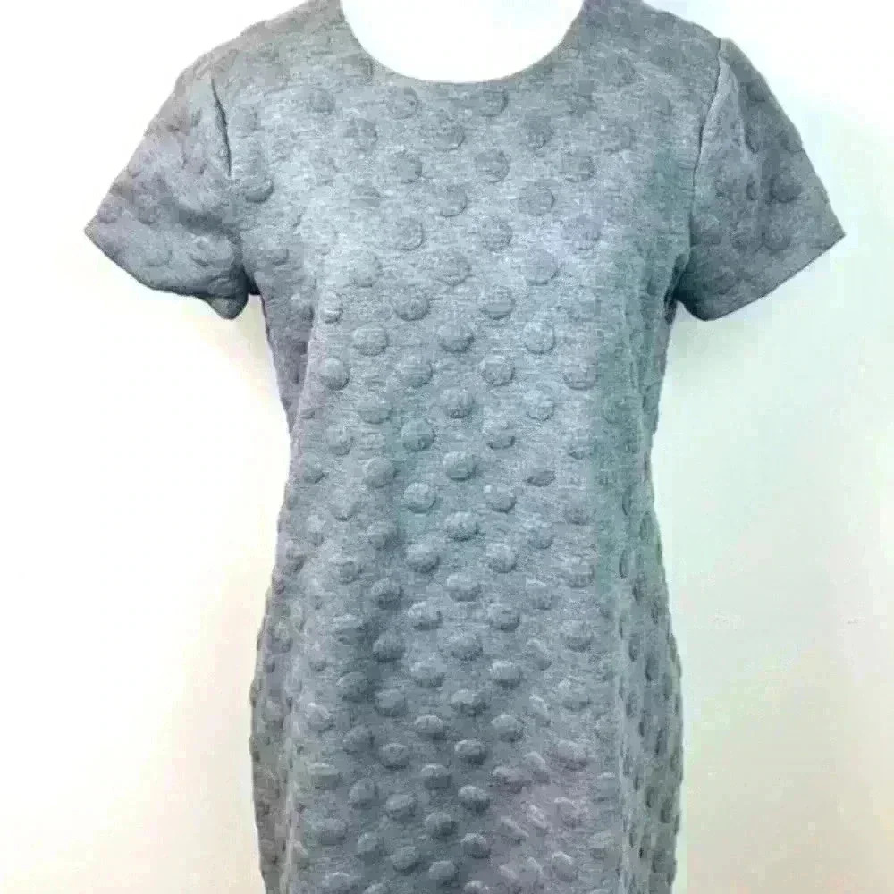 Cece beautiful, textured thick, gray shift dress with circle accents throughout